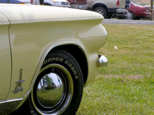How many Corvairs are in this photo? What are they?winner will be announced soon!