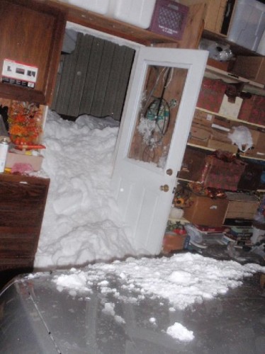 The snow pushed the door in...