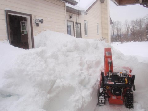 Little machine against big pile...