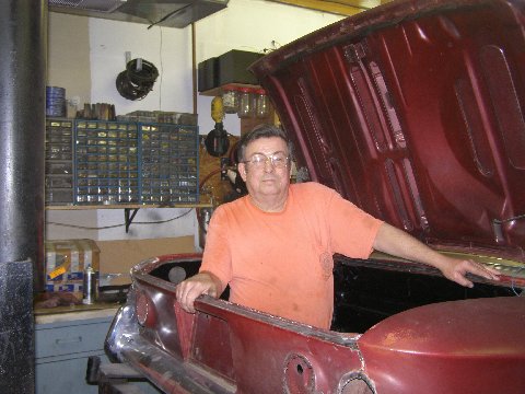 Checking out the engine compartment in the Coupe