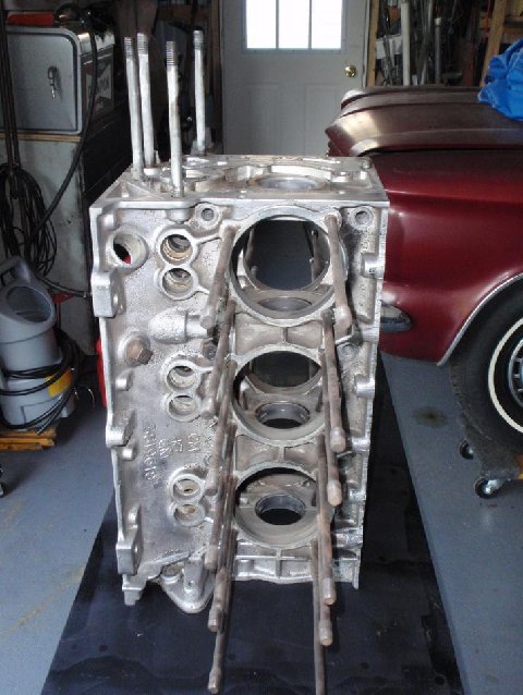 left side of factory replacement bare block. note the plugged hole that they never used in production. the rear hole is for Forward Control use ( lakewood , greenbrier , rampside etc)