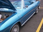Nice blue late convertible with wires.